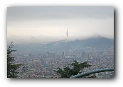 Zicht vanop Montjuic op de stad